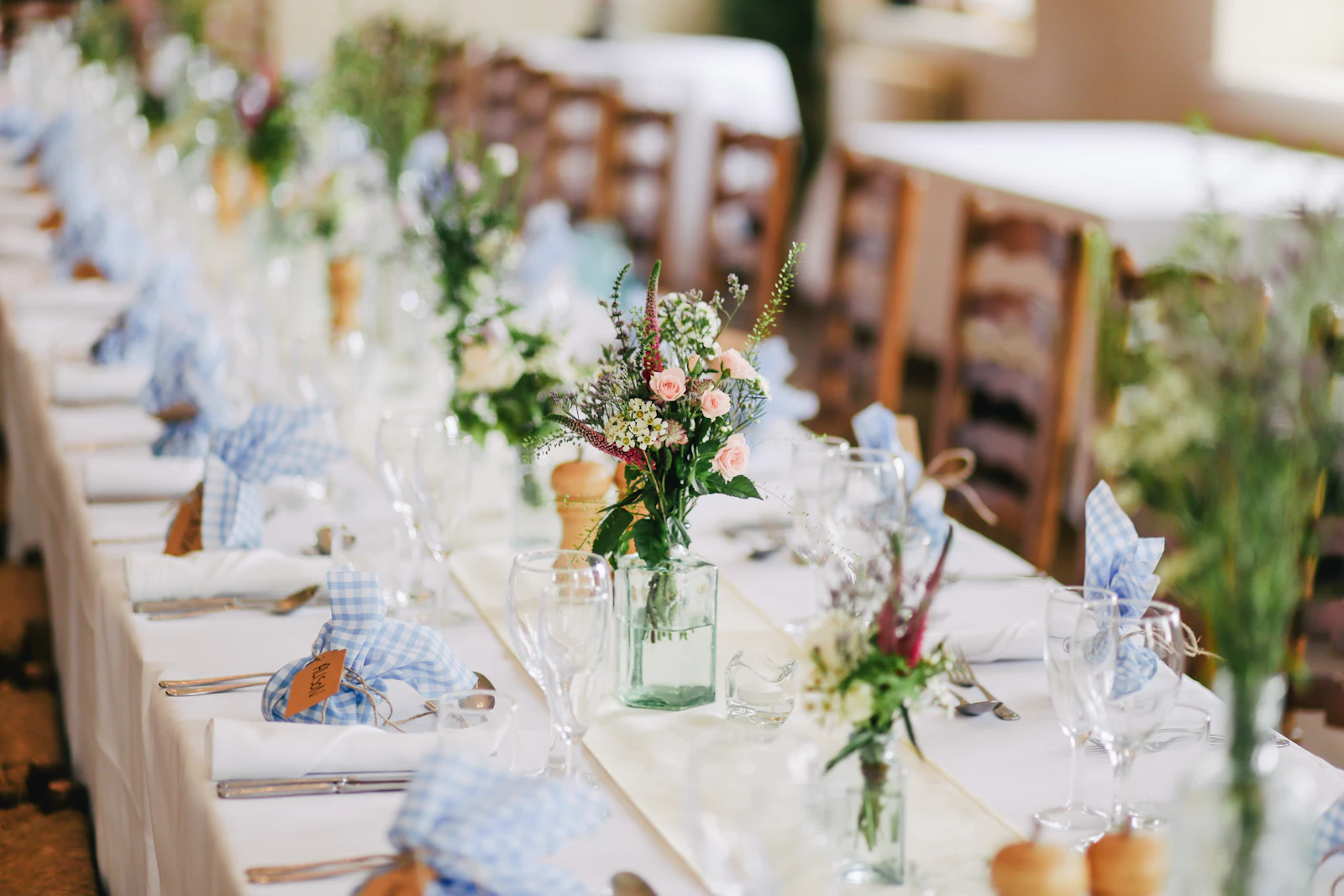 Champagne pour at a wedding reception bar